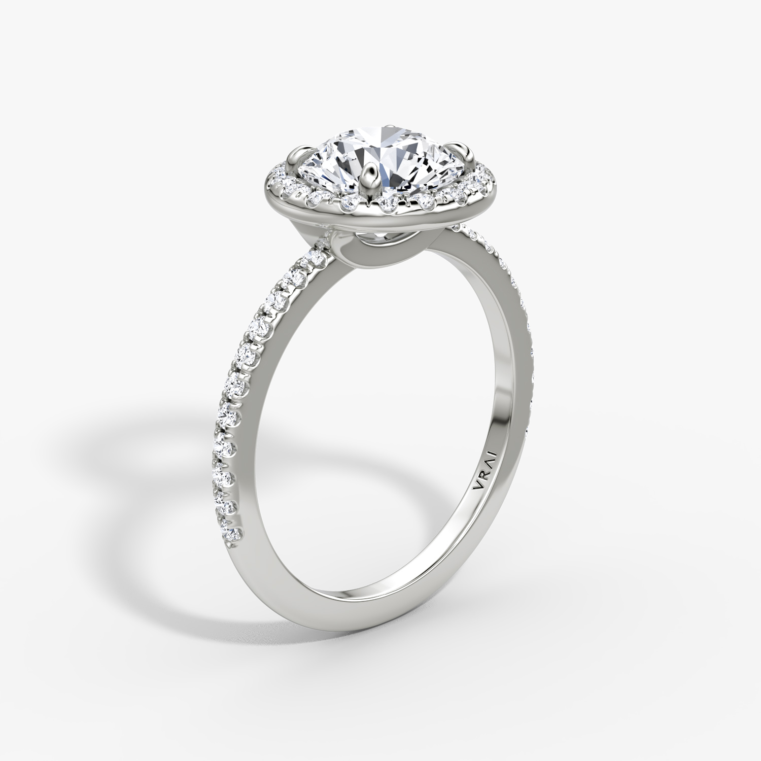 The Halo | Round Brilliant | Platinum | bandAccent: Pavé | caratWeight: 1.0ct | haloSize: original | diamondOrientation: vertical