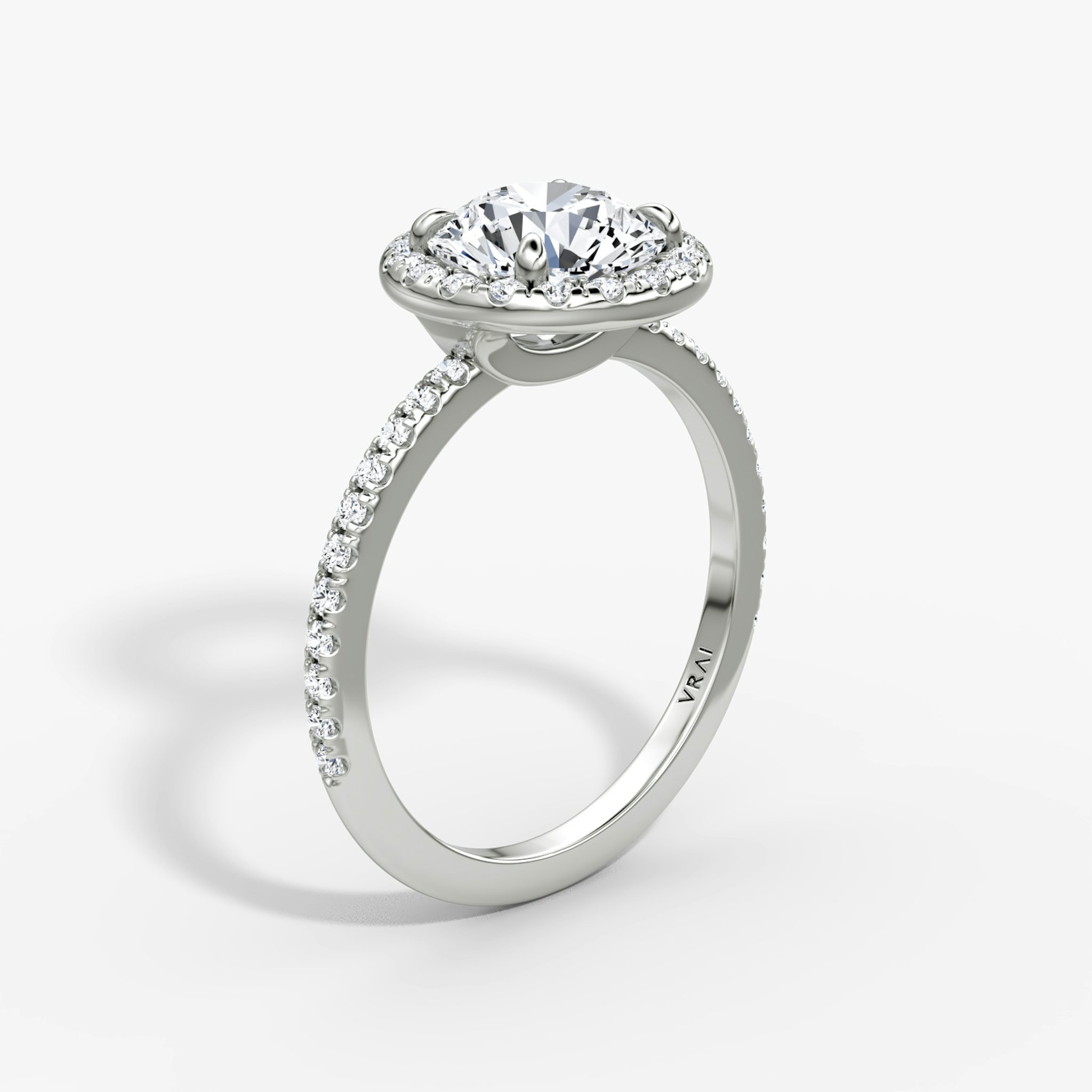 The Halo | Round Brilliant | Platinum | bandAccent: Pavé | caratWeight: 1.0ct | haloSize: original | diamondOrientation: vertical