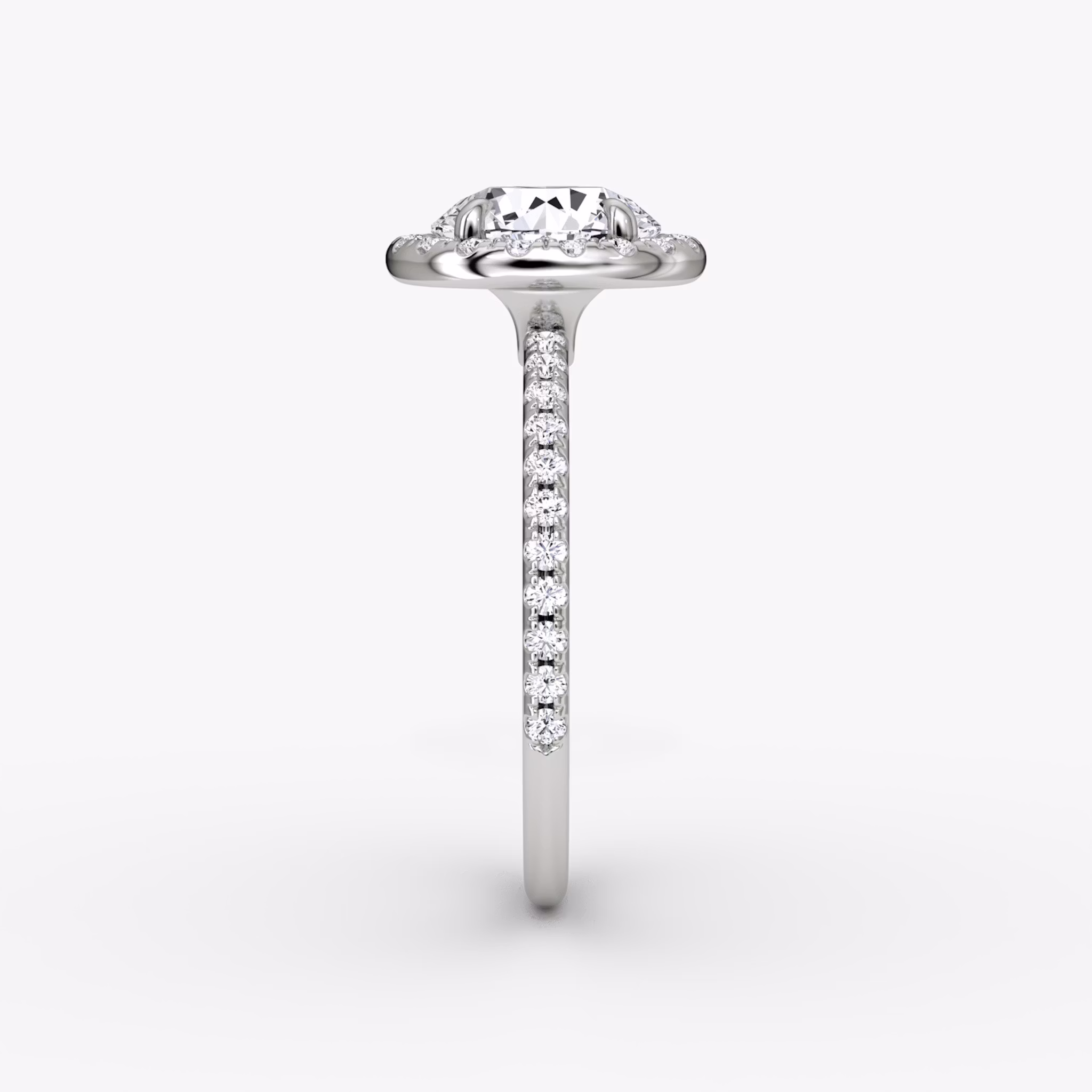 The Halo | Round Brilliant | Platinum | bandAccent: Pavé | caratWeight: 1.0ct | haloSize: original | diamondOrientation: vertical