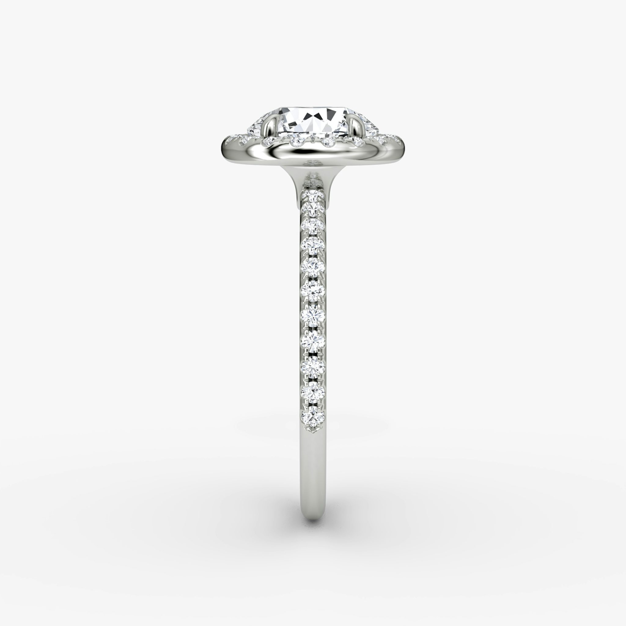 The Halo | Round Brilliant | Platinum | bandAccent: Pavé | caratWeight: 1.0ct | haloSize: original | diamondOrientation: vertical