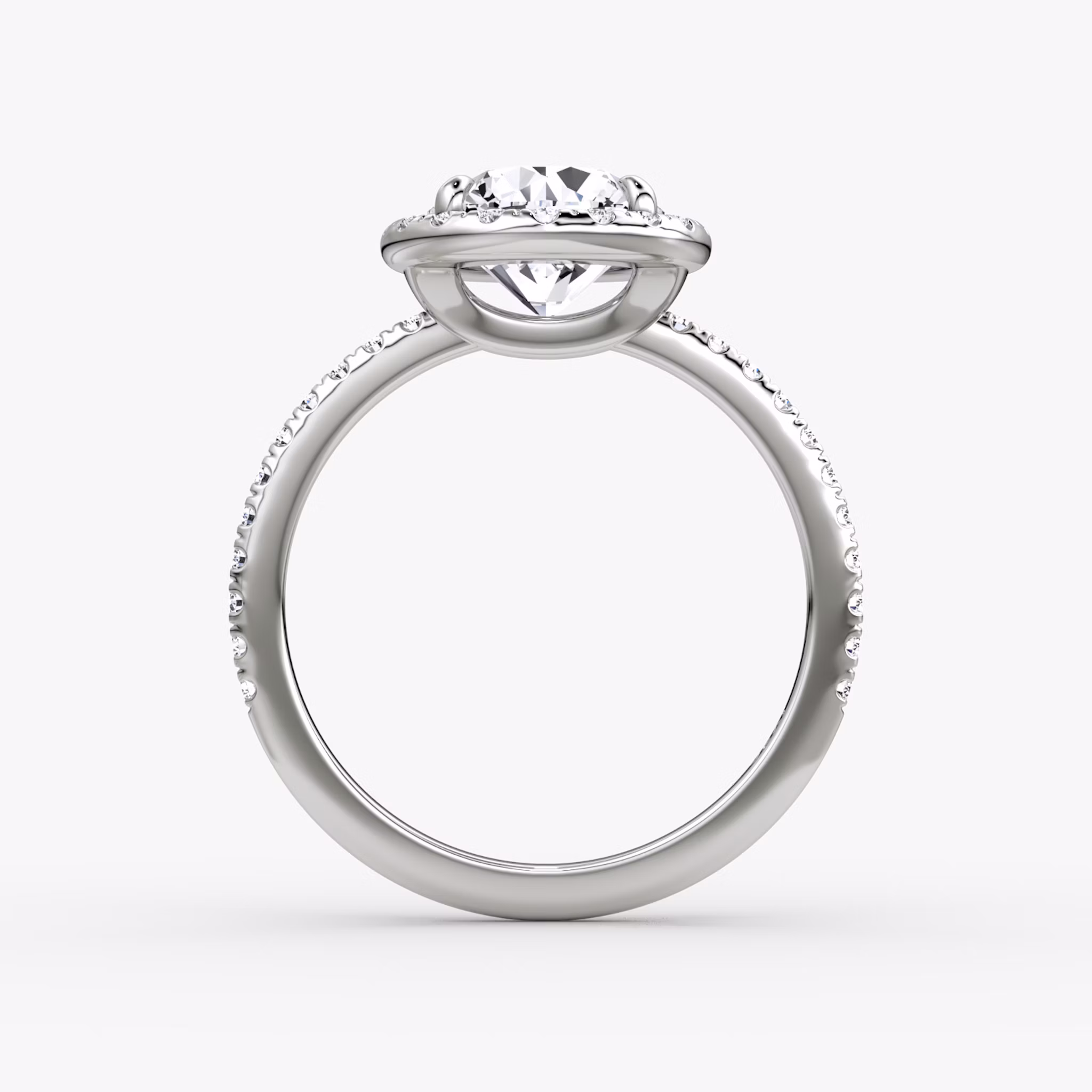 The Halo | Round Brilliant | Platinum | bandAccent: Pavé | caratWeight: 1.0ct | haloSize: original | diamondOrientation: vertical