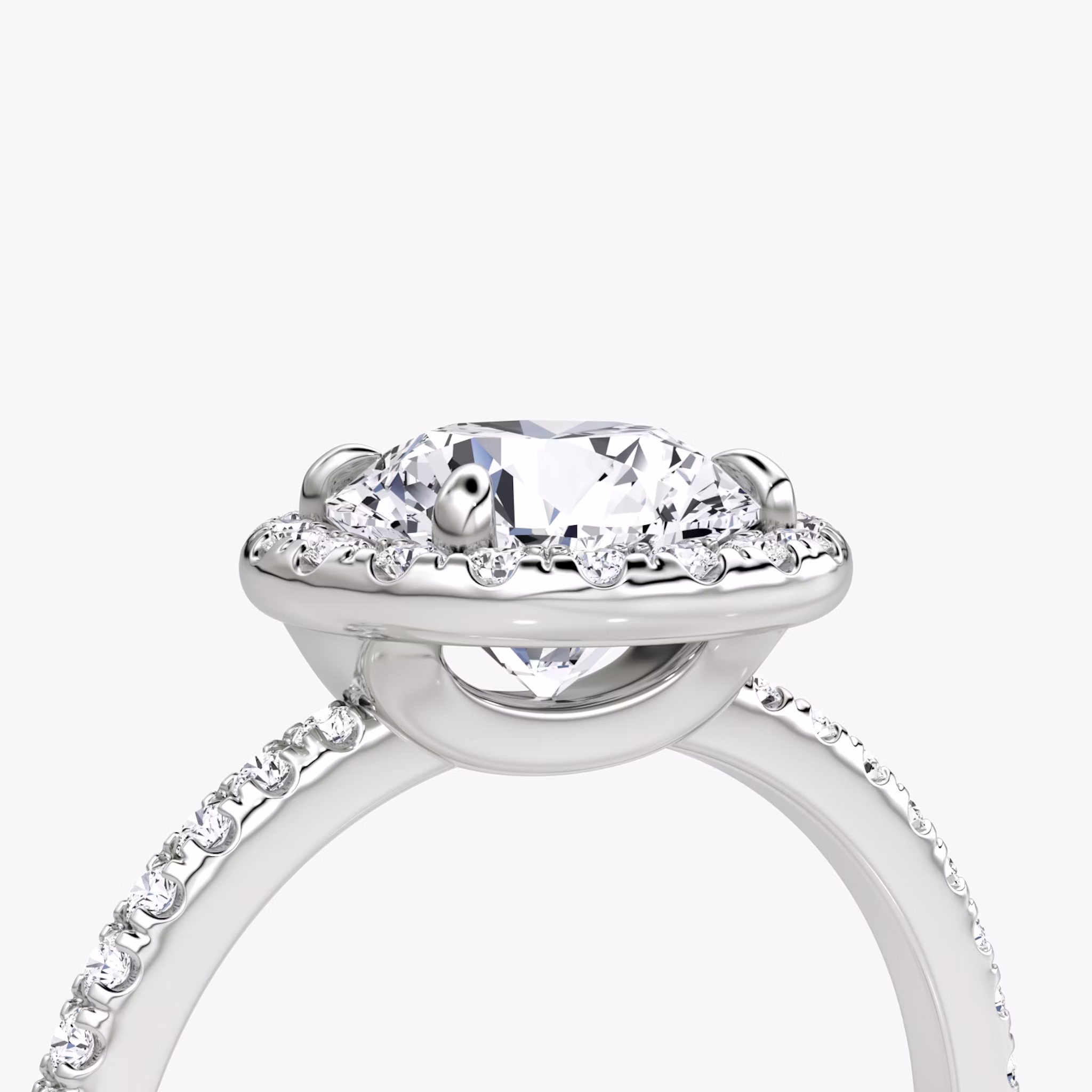 The Halo | Round Brilliant | Platinum | bandAccent: Pavé | caratWeight: 1.0ct | haloSize: original | diamondOrientation: vertical