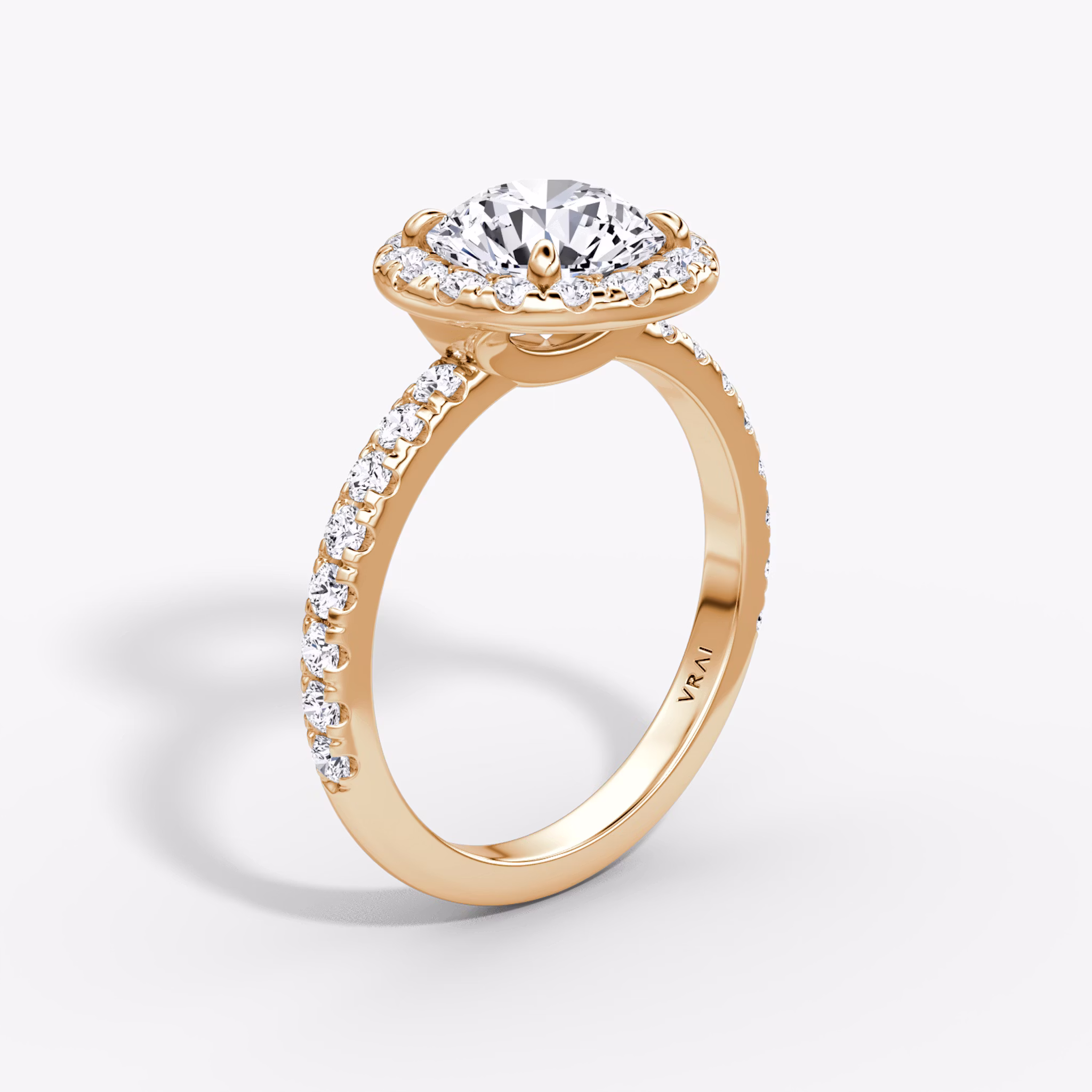 The Halo | Round Brilliant | 14k | Rose Gold | bandAccent: Pavé | caratWeight: other | haloSize: large | diamondOrientation: vertical