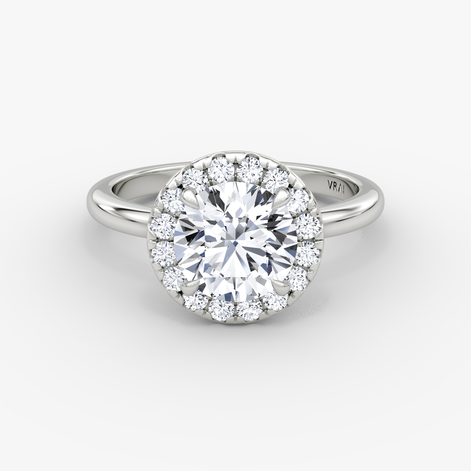 The Halo | Round Brilliant | 18k | White Gold | bandAccent: Plain | caratWeight: other | haloSize: large | diamondOrientation: vertical
