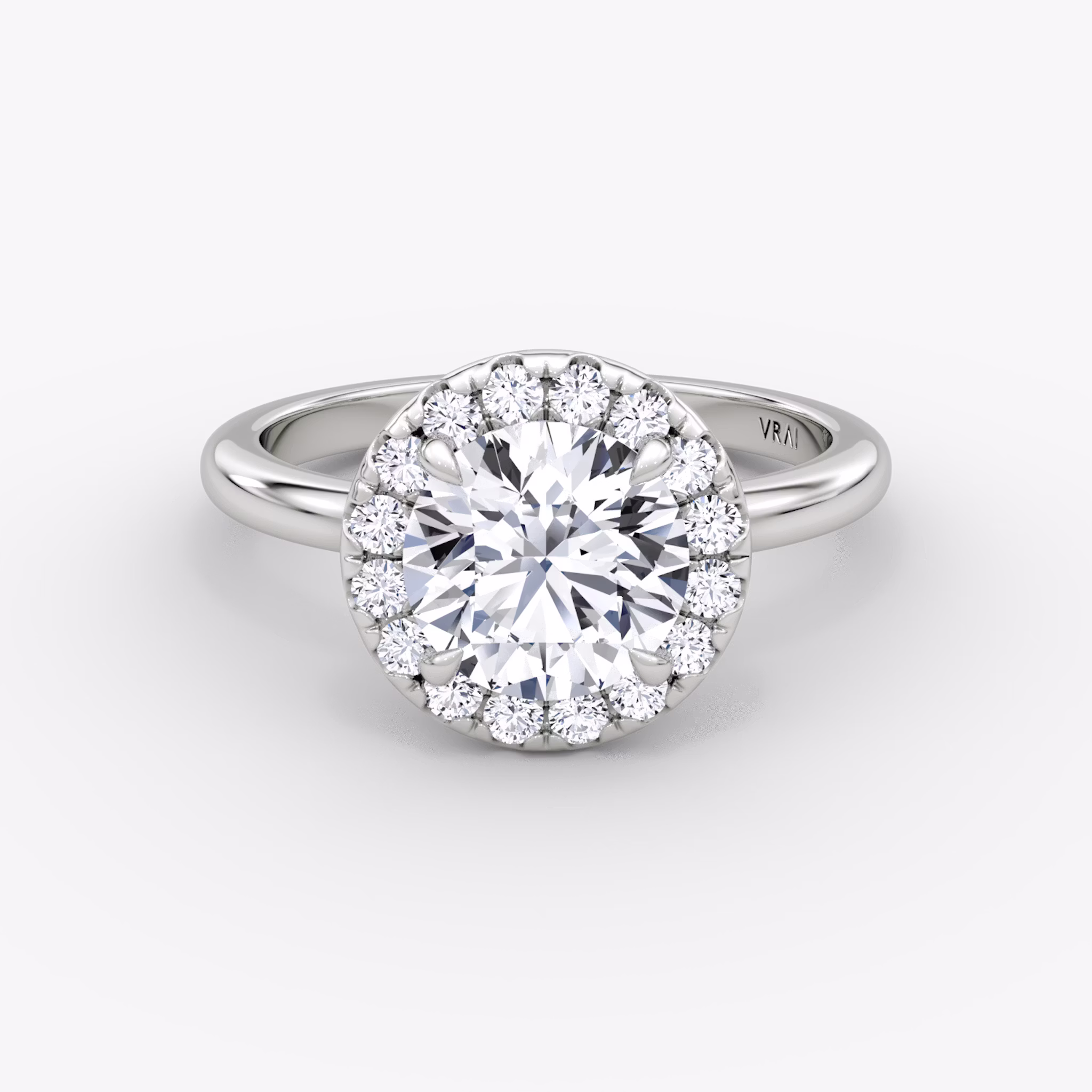 The Halo | Round Brilliant | 18k | White Gold | bandAccent: Plain | caratWeight: other | haloSize: large | diamondOrientation: vertical