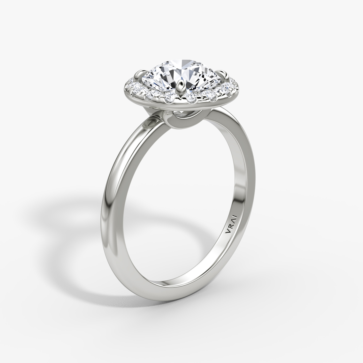 The Halo | Round Brilliant | 18k | White Gold | bandAccent: Plain | caratWeight: other | haloSize: large | diamondOrientation: vertical