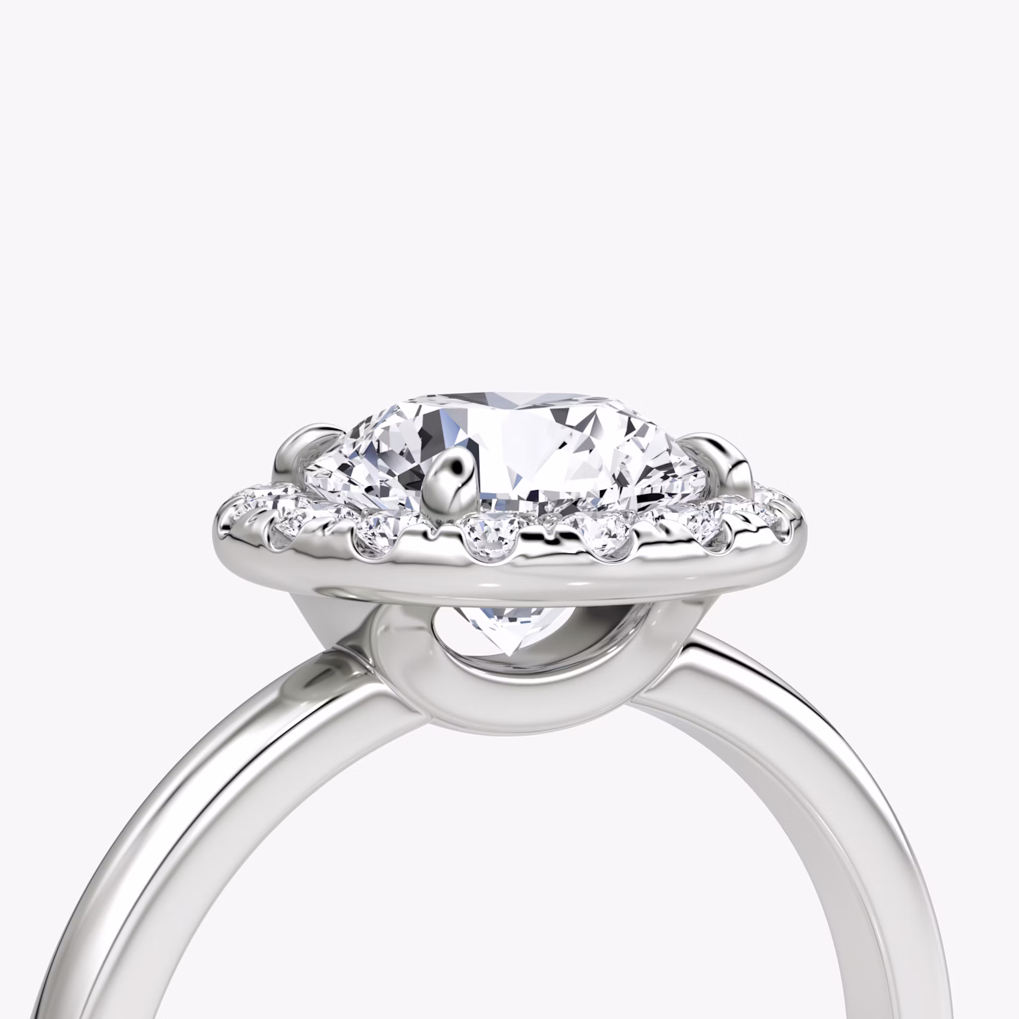 The Halo | Round Brilliant | 18k | White Gold | bandAccent: Plain | caratWeight: other | haloSize: large | diamondOrientation: vertical
