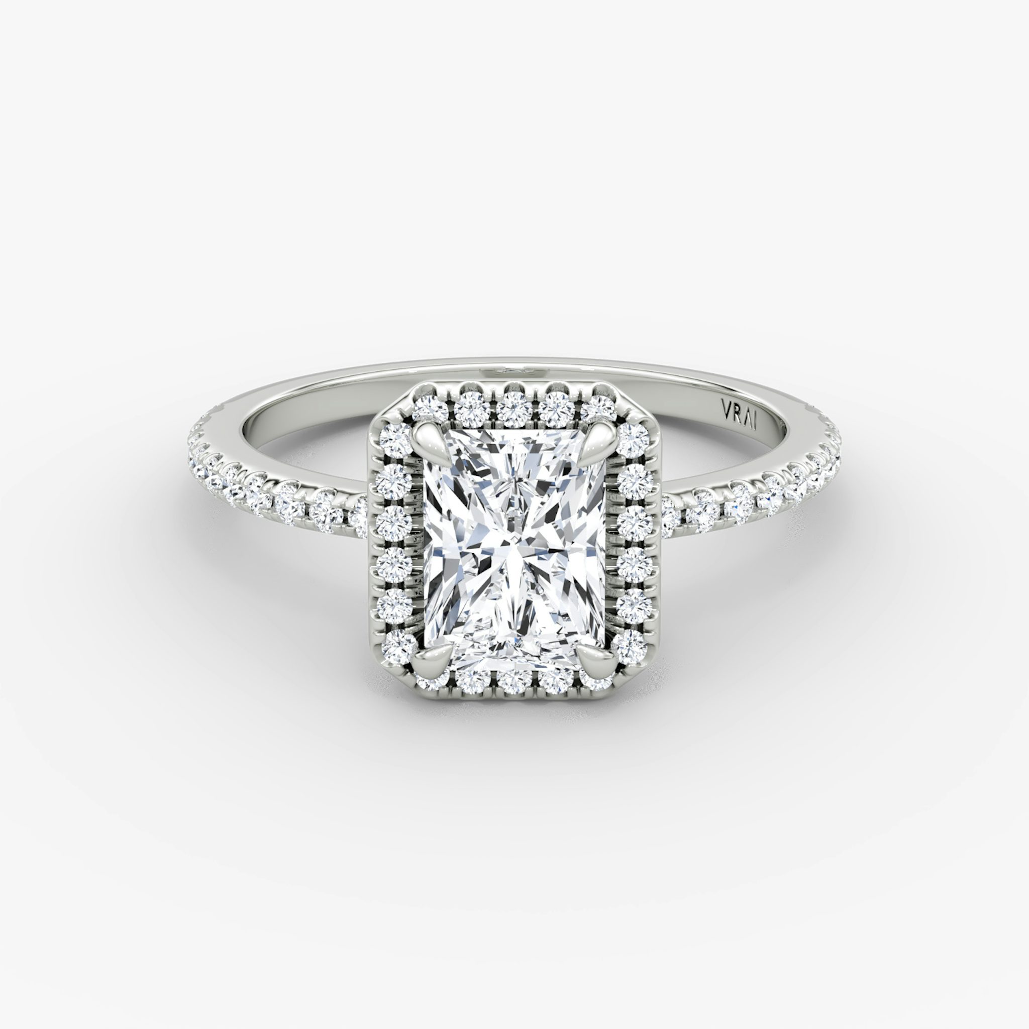 The Halo | Radiant | Platinum | bandAccent: Pavé | haloSize: original | diamondOrientation: vertical | caratWeight: other