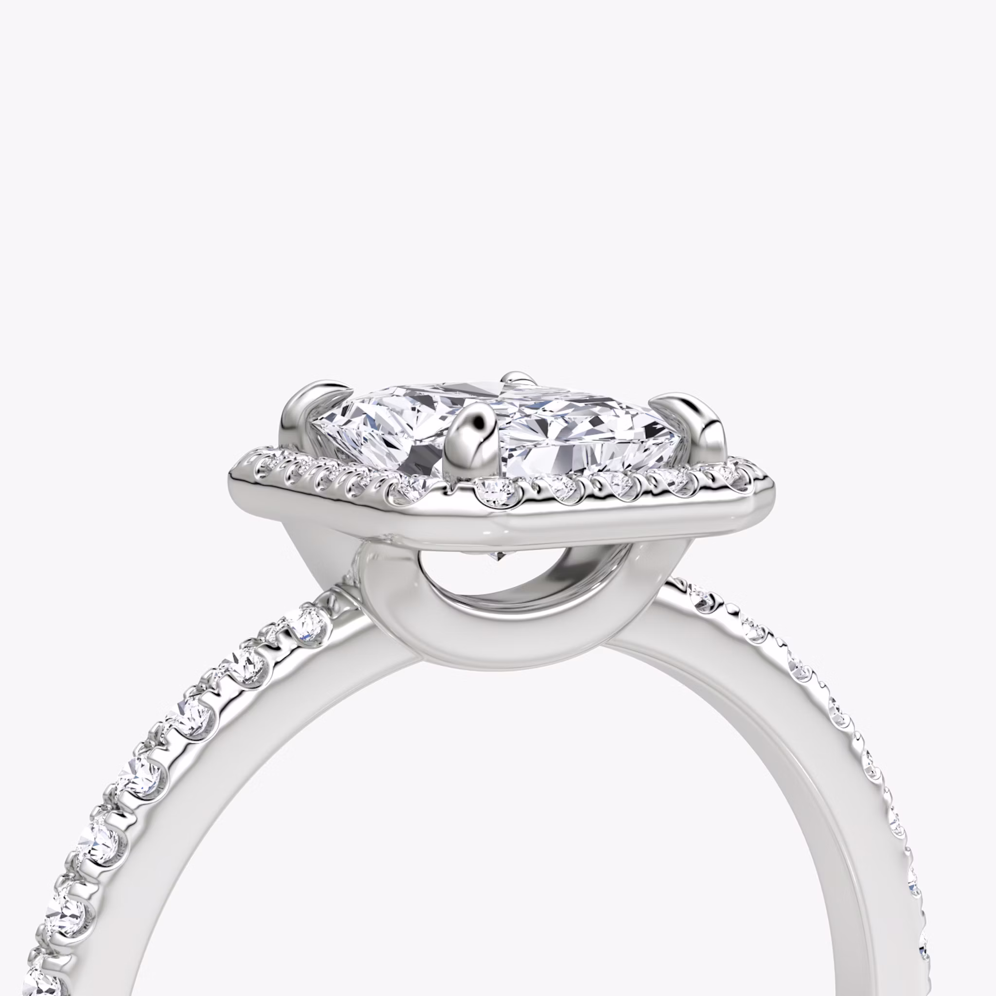 The Halo | Radiant | Platinum | bandAccent: Pavé | haloSize: original | diamondOrientation: vertical | caratWeight: other