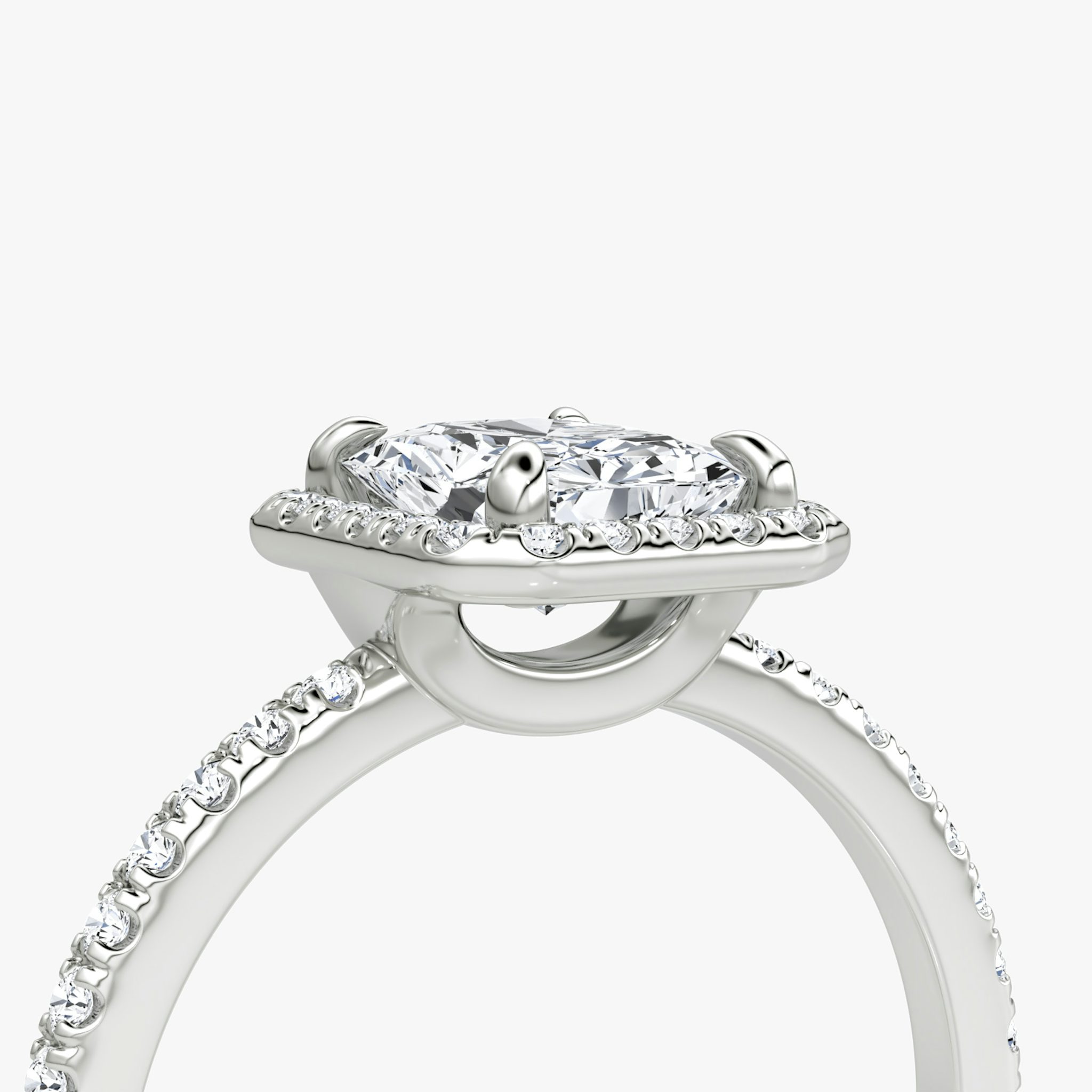 The Halo | Radiant | Platinum | bandAccent: Pavé | haloSize: original | diamondOrientation: vertical | caratWeight: other