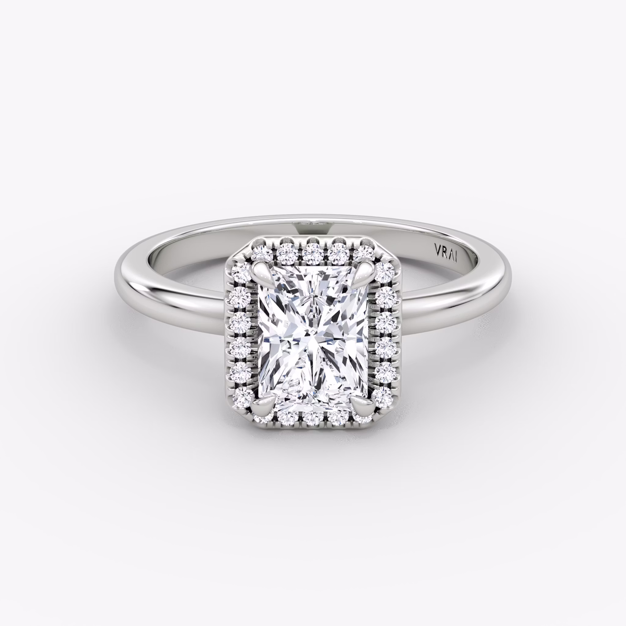 The Halo | Radiant | Platinum | bandAccent: Plain | haloSize: original | diamondOrientation: vertical | caratWeight: other