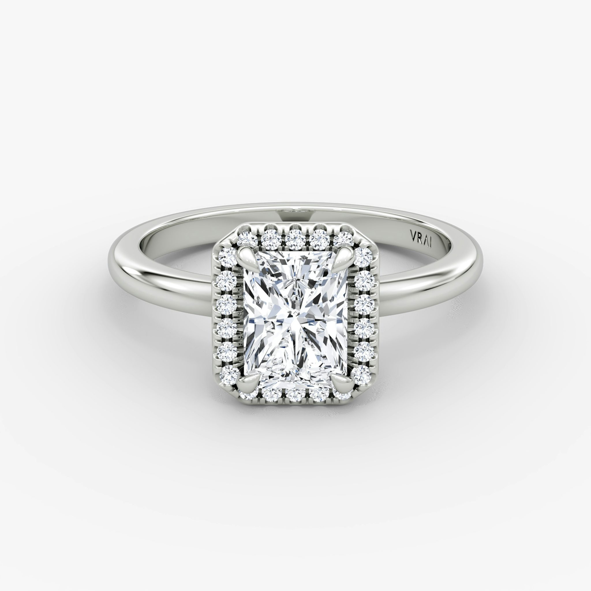 The Halo | Radiant | Platinum | bandAccent: Plain | haloSize: original | diamondOrientation: vertical | caratWeight: other