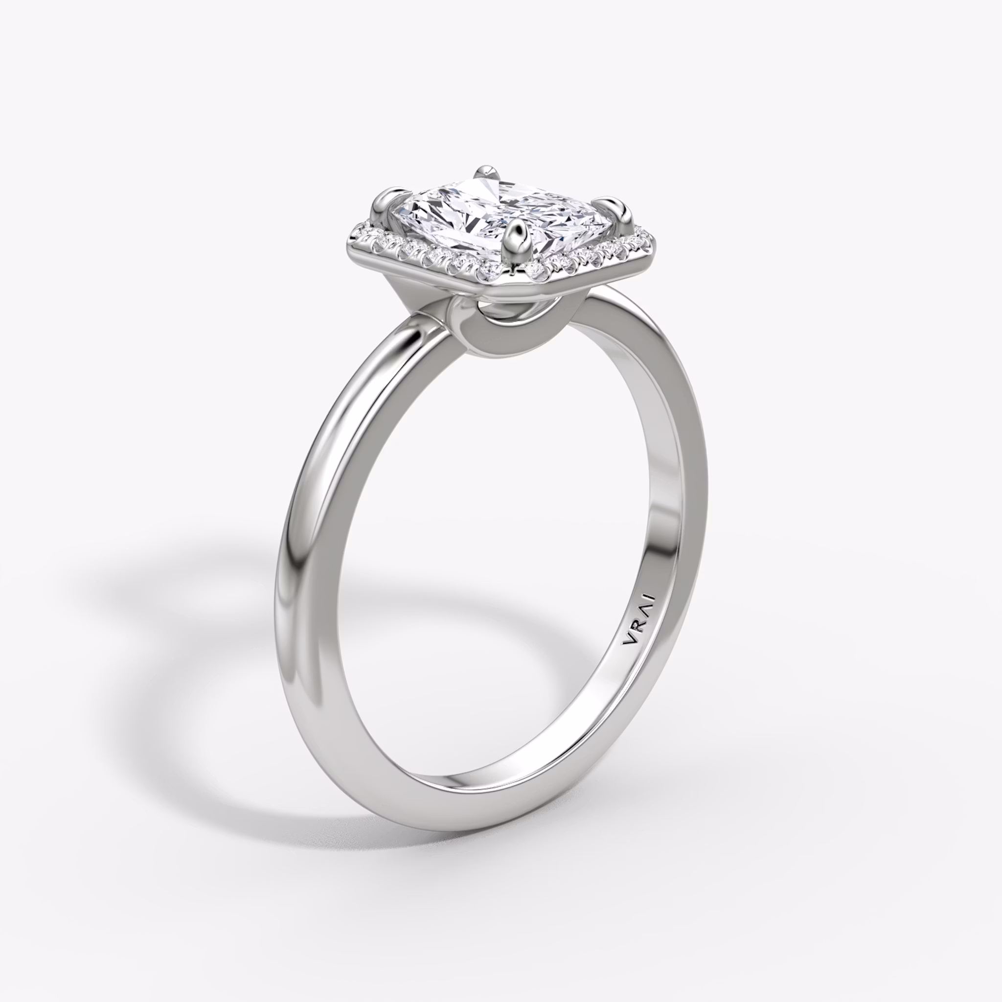 The Halo | Radiant | Platinum | bandAccent: Plain | haloSize: original | diamondOrientation: vertical | caratWeight: other