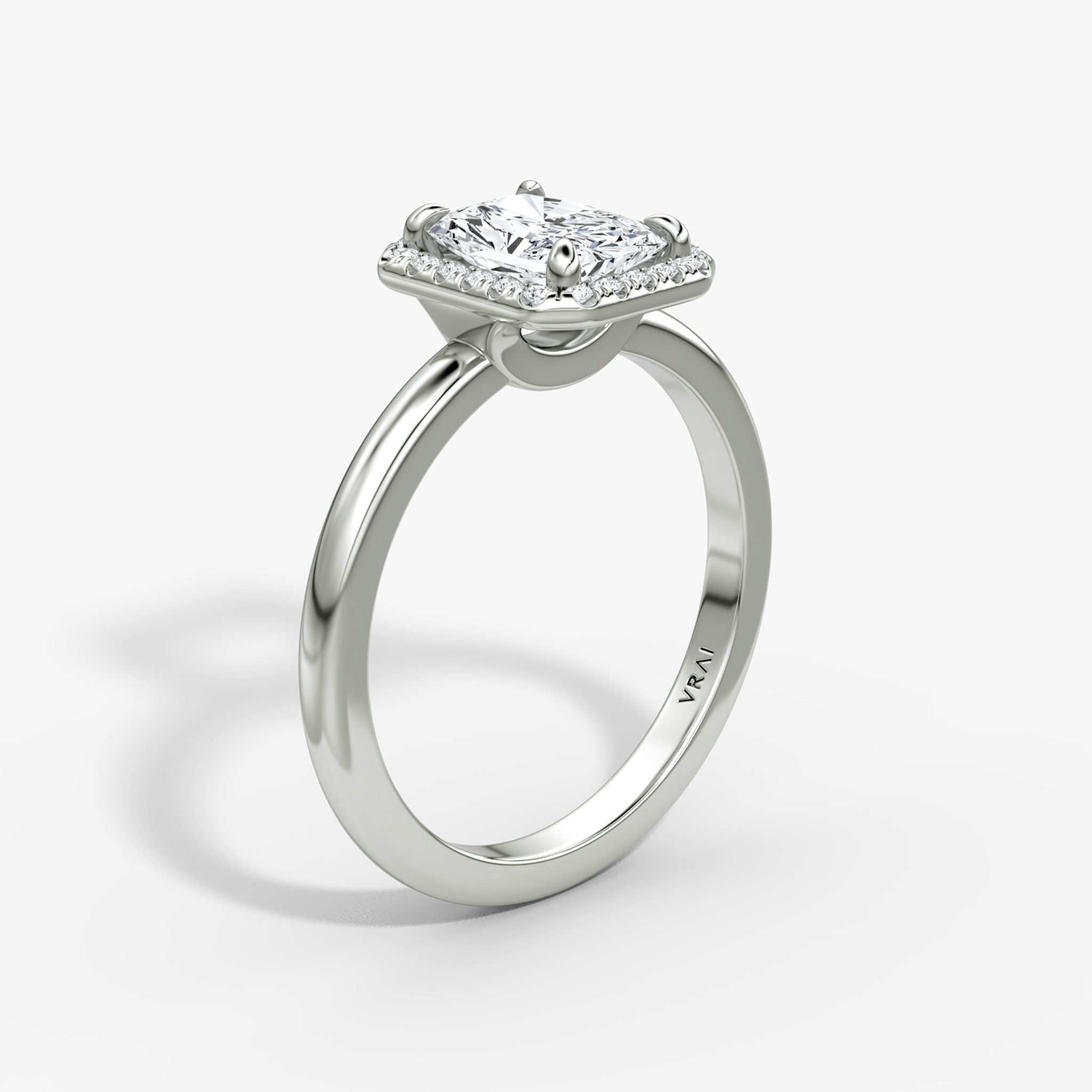 The Halo | Radiant | Platinum | bandAccent: Plain | haloSize: original | diamondOrientation: vertical | caratWeight: other