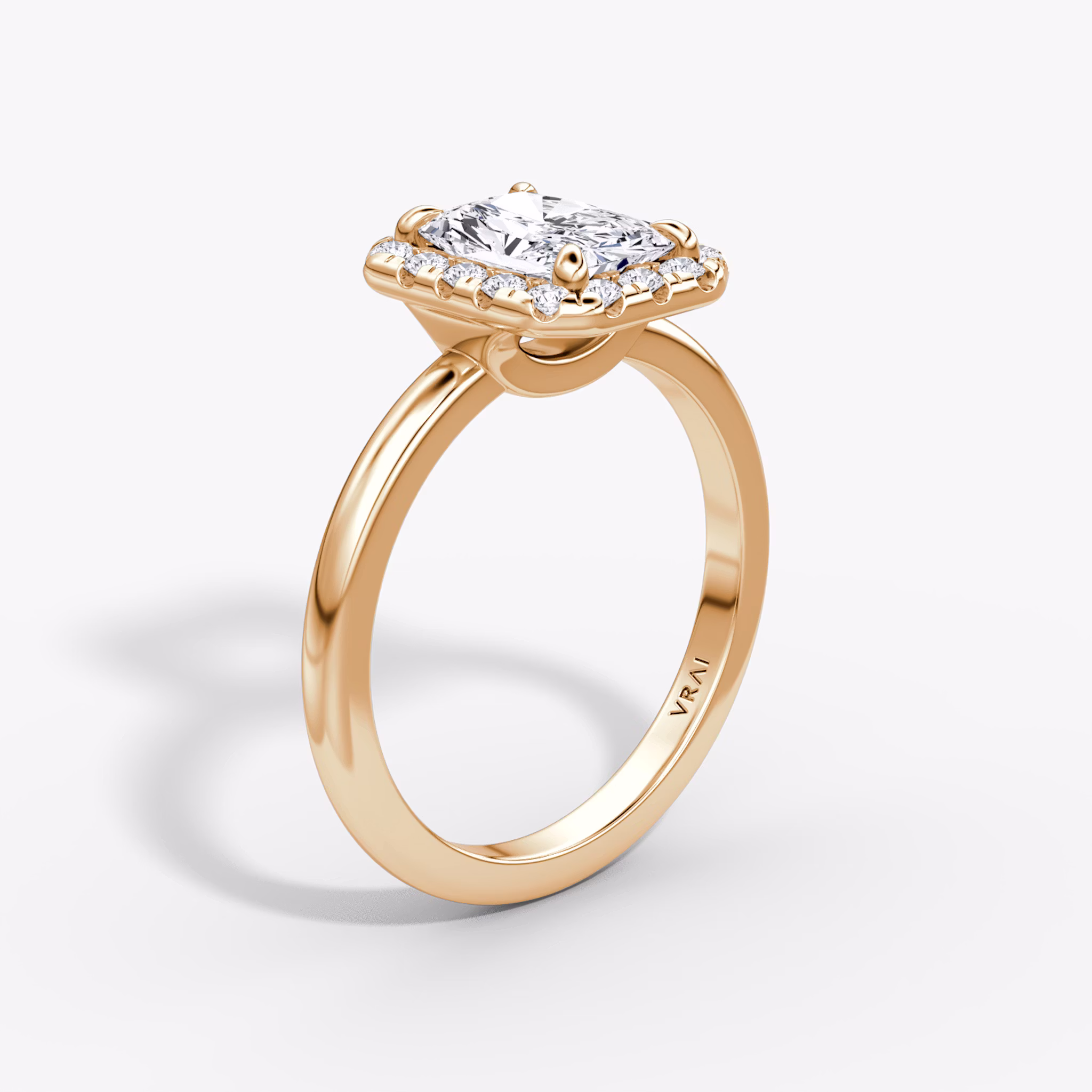 Anillo de compromiso Halo | Radiante | 14k | Oro rosa | bandAccent: Simple | haloSize: large | diamondOrientation: vertical | caratWeight: other